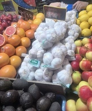 Our Garlic Shines At The Hague Market – A Heartwarming Surprise From Home